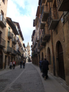 Puente la Reina Main Street with the Church at the end