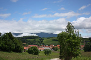Village of Espinal among the green landscape in a sunny day