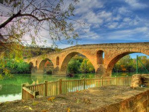 Medieval bridge over a river in Puente la Reina