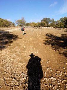 The shadow of a pilgrim in the ascent to the mountain range of Atapuerca